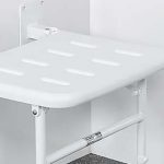 white mobility shower seat with drainage slots
