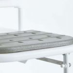 Chester shower seat has a padded grey seat