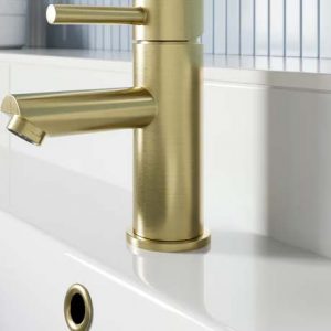 Basin mixer in brushed brass