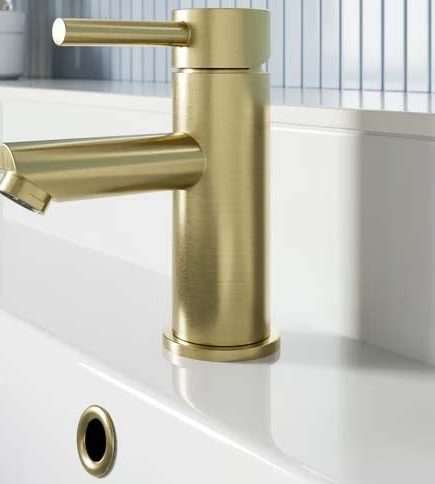 Basin mixer in brushed brass