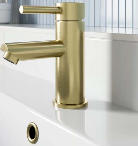 Basin mixer in brushed brass