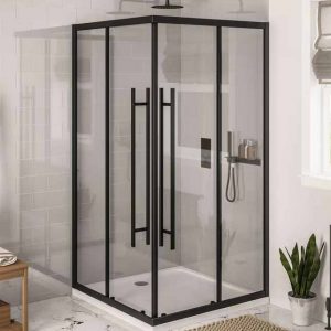 Black-framed glass shower enclosure with two sliding doors in a modern bathroom; rainfall showerhead and handheld shower visible inside.
