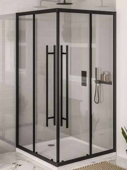 Black-framed glass shower enclosure with two sliding doors in a modern bathroom; rainfall showerhead and handheld shower visible inside.