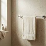 chrome towel rail on wall